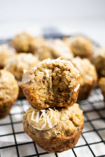 close up of stacked baby banana muffins